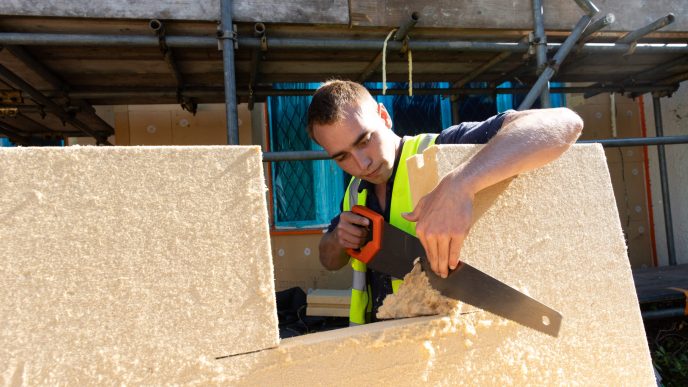 cutting a window square hole into an external wall insulation board