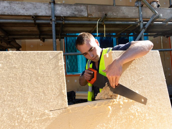 cutting a window square hole into an external wall insulation board